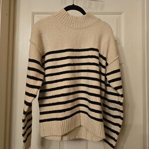 Elegant Black and Cream Striped Women's Turtleneck Sweater